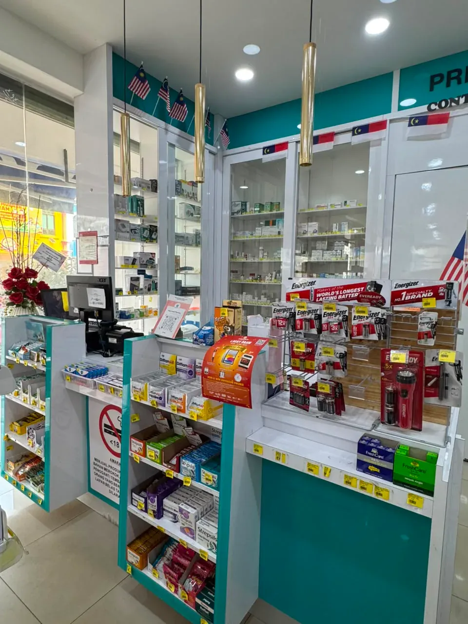 Health essentials display beside the Bukit Baru counter