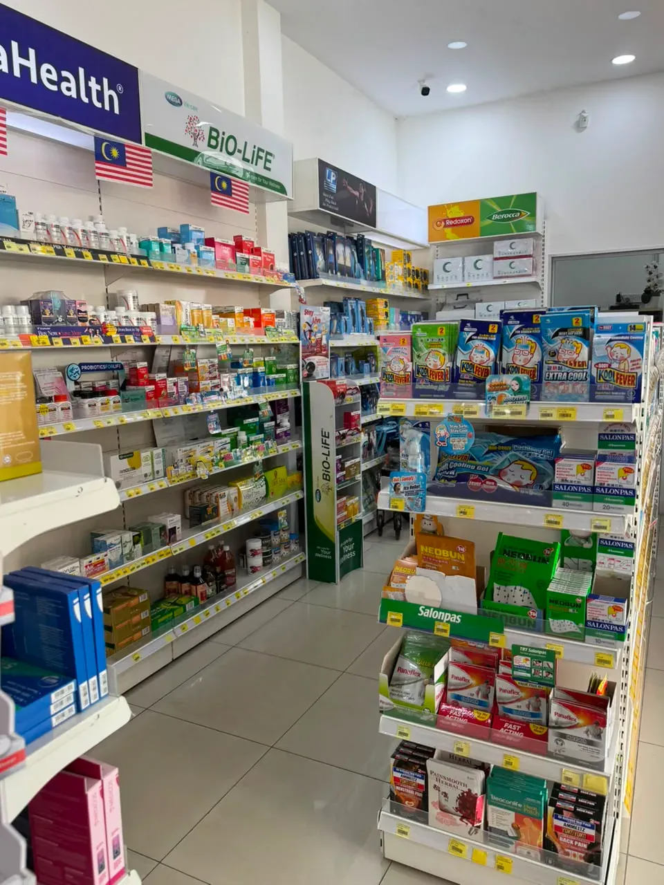 Health products aisle at Farmasi Limbongan Bukit Baru