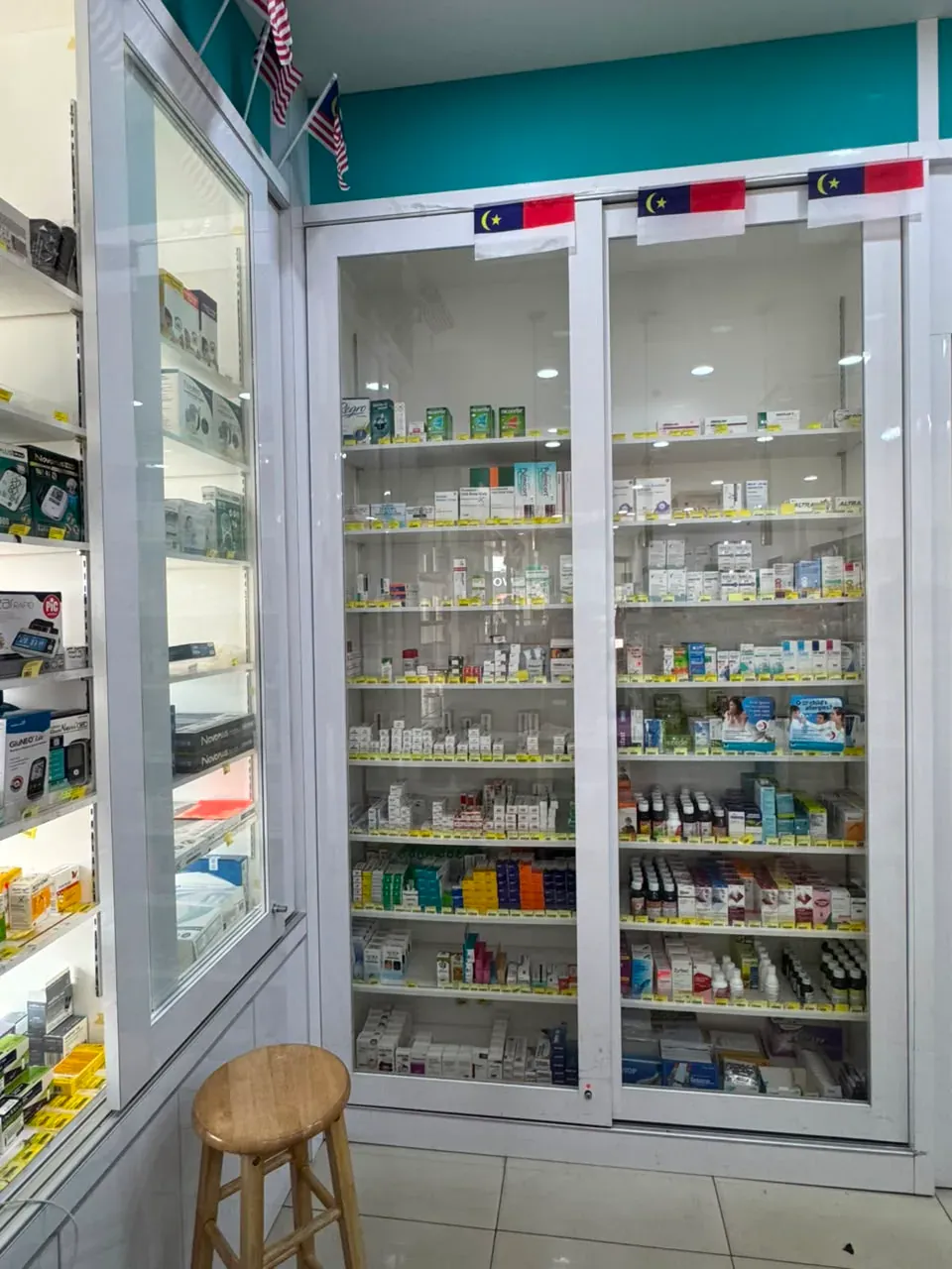 Medicine cabinets at Farmasi Limbongan Bukit Baru